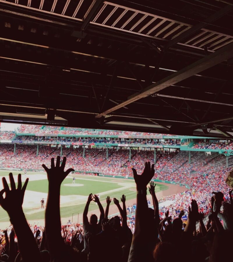 crowds cheering in a boston red sox game | Mobiquity careers in Boston Massachusetts office